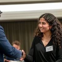 receiving award from bayo